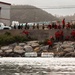 US Marines, Republic of Korea Marines and Sailors, and local community volunteers help clean the earth