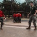 US Marines, Republic of Korea Marines and Sailors, and local community volunteers help clean the earth