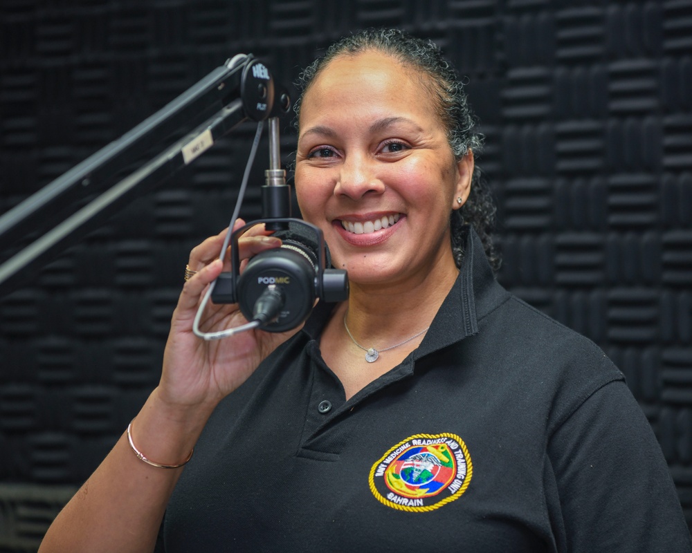 Cmdr. Elyse Braxton poses for a photo in the AFN Bahrain Studio