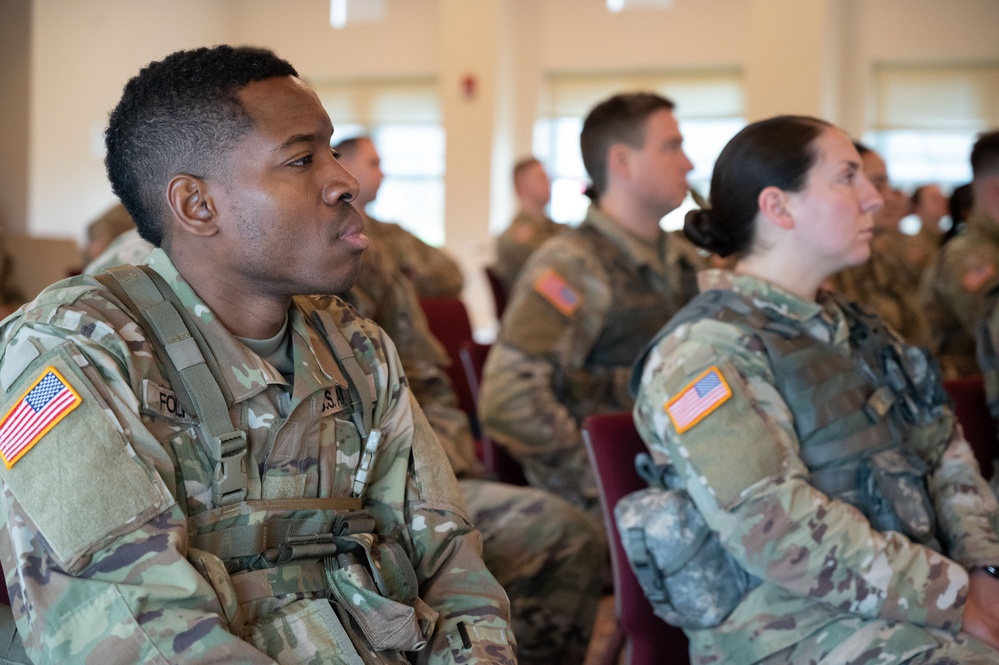 Members from the 169th Regiment (Regional Training Institute) observe Holocaust Remembrance event.