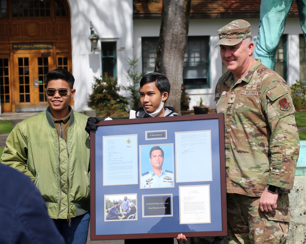 Air National Guard leaders visit with Fallen Malaysian Officer's family