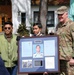 Air National Guard leaders visit with Fallen Malaysian Officer's family