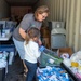 Volunteers HAnd OUt Hygiene Items in Cobb Park in Covington