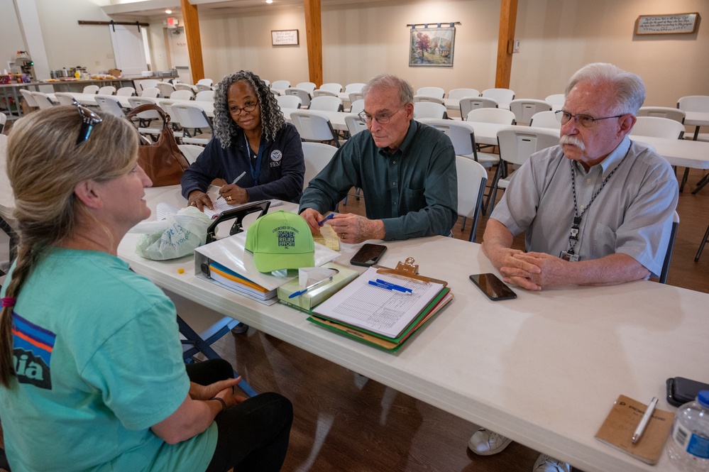 A FEMA Volunteer Liaison Team Meets With Non-Profit Organization in Covington