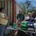 A FEMA Volunteer Liaison Team Meets With Non-Profit Organization in Covington