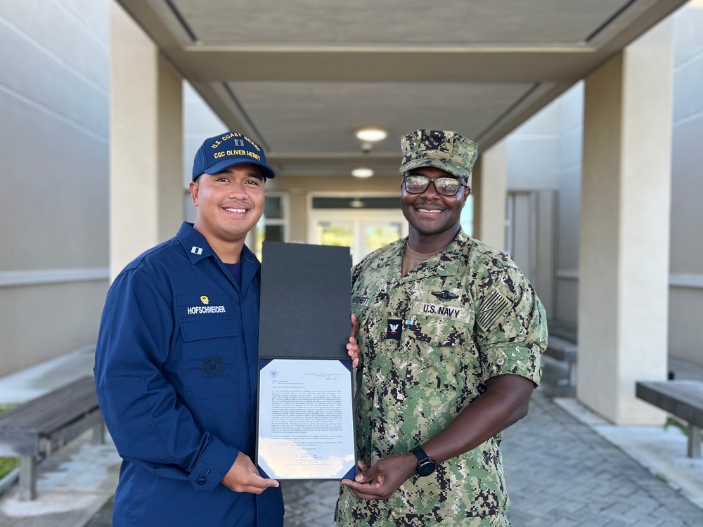 U.S. Coast Guard awards letter of commendation to U.S. Navy corpsman