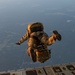Special Tactics Airmen jump from a Marine Corps KC-130J Hercules