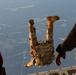 Special Tactics Airmen jump from a Marine Corps KC-130J Hercules