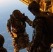 Special Tactics Airmen jump from a Marine Corps KC-130J Hercules