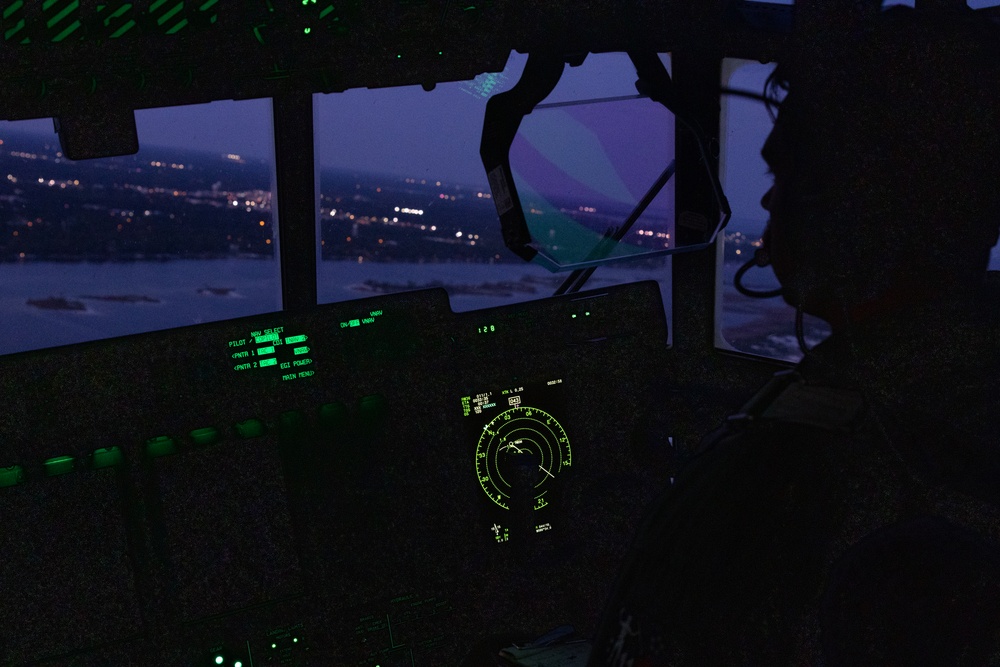 Special Tactics Airmen jump from a Marine Corps KC-130J Hercules