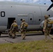 Special Tactics Airmen jump from a Marine Corps KC-130J Hercules