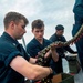 Sailors Conduct Ammo Upload Aboard USS John Finn (DDG 113)