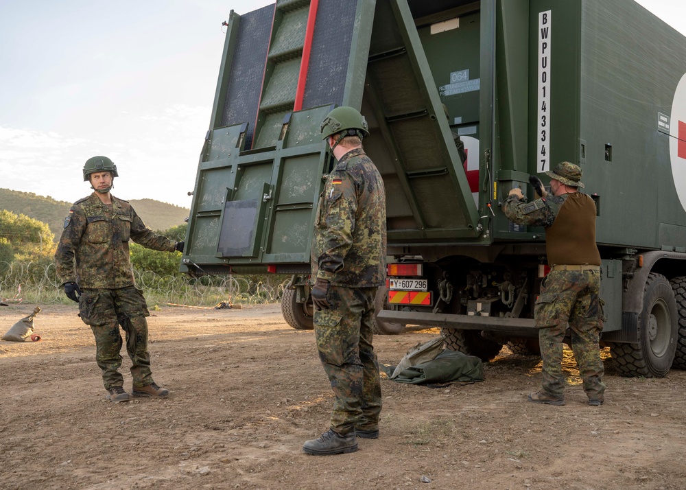 GERMAN SOLDIERS BUILD ROLE 1 MEDICAL FACILITY ON THE FIELD