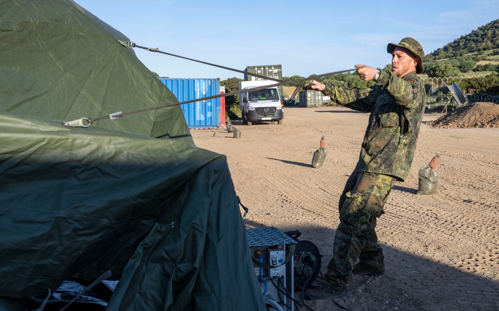 GERMAN SOLDIERS BUILD ROLE 1 MEDICAL FACILITY ON THE FIELD