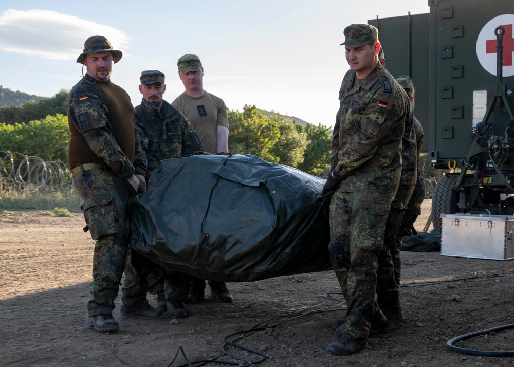 GERMAN SOLDIERS BUILD ROLE 1 MEDICAL FACILITY ON THE FIELD