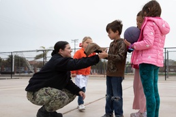 Sailors volunteer with Operation Pals
