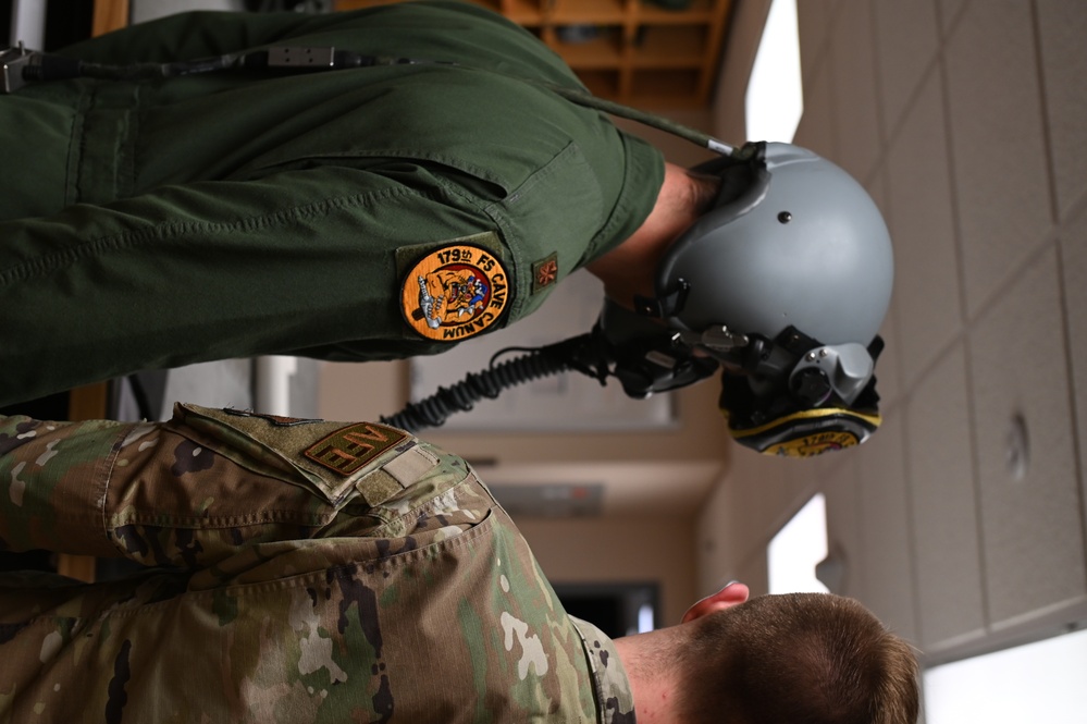 Aircrew Flight Equipment conducts helmet inspections