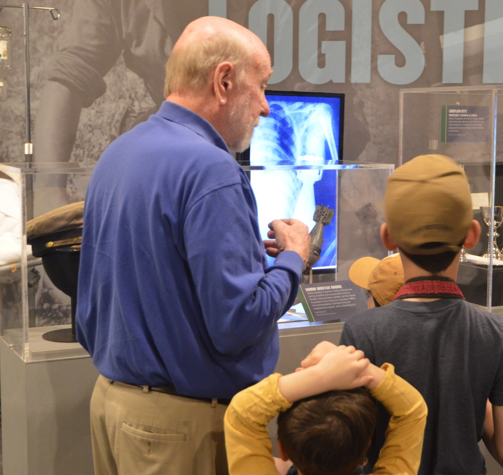 Museum Volunteer engages with visitors