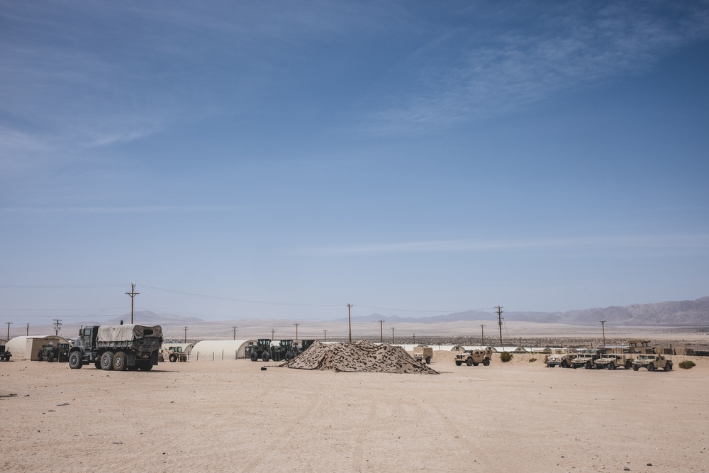 U.S. Marines with Combat Logistics Battalion 24 Practice Camouflage Techniques