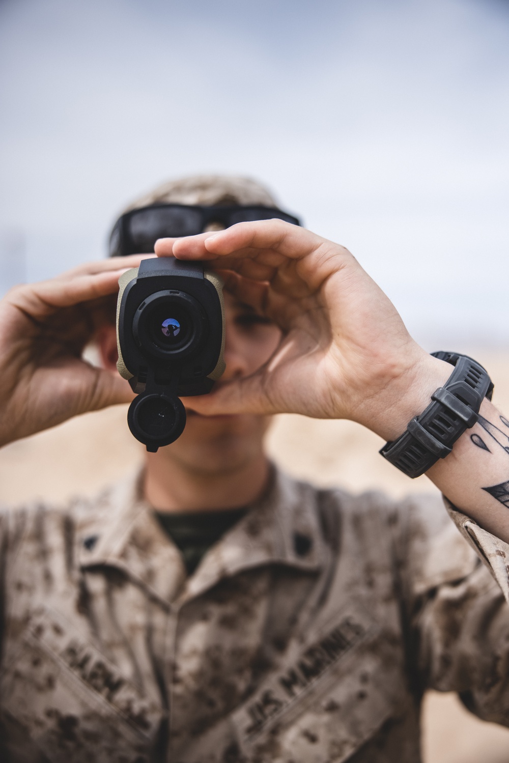 U.S. Marines with Combat Logistics Battalion 24 Practice Camouflage Techniques