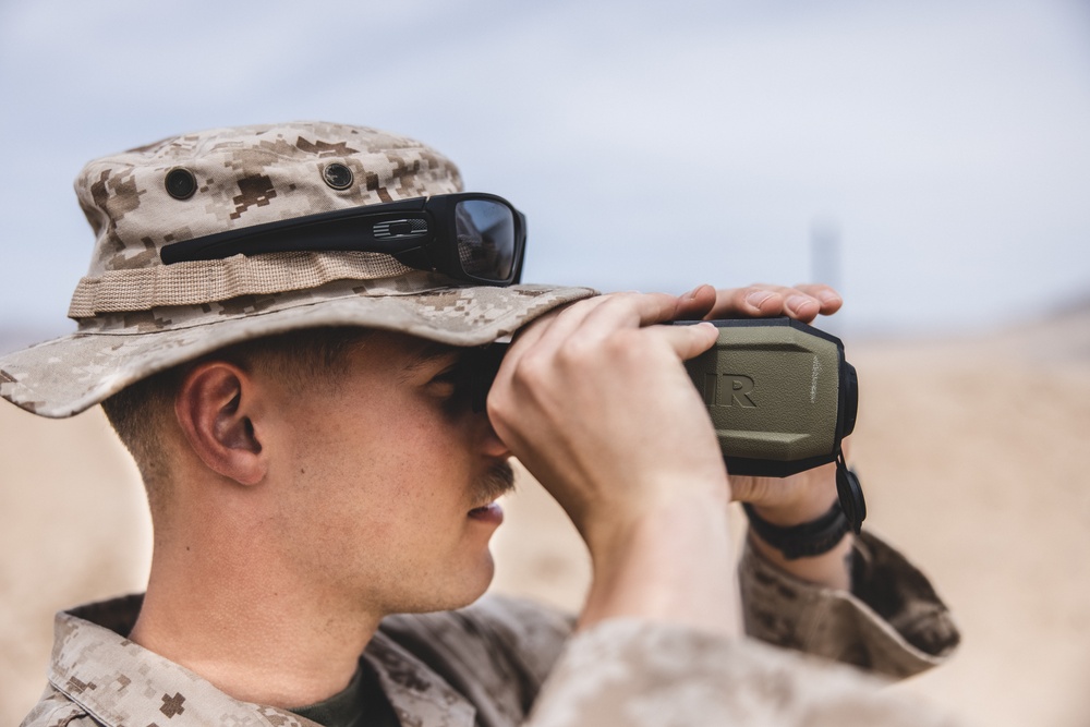 U.S. Marines with Combat Logistics Battalion 24 Practice Camouflage Techniques