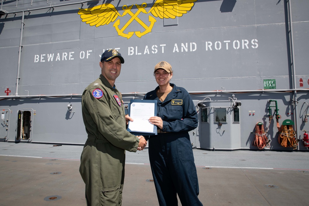 USS Tripoli Pins Two New Surface Warfare Officers