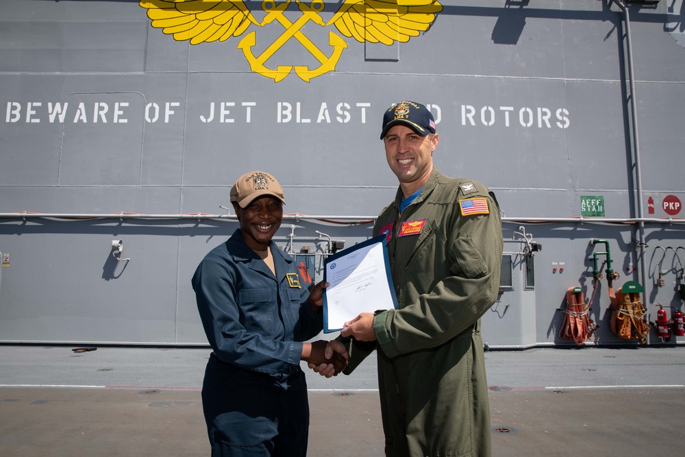 USS Tripoli Pins Two New Surface Warfare Officers