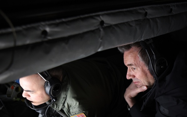 German leaders from the local community observe an aerial refueling mission