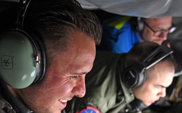 German leaders from the local community observe an aerial refueling mission