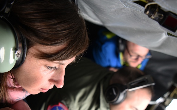 German leaders from the local community observe an aerial refueling mission