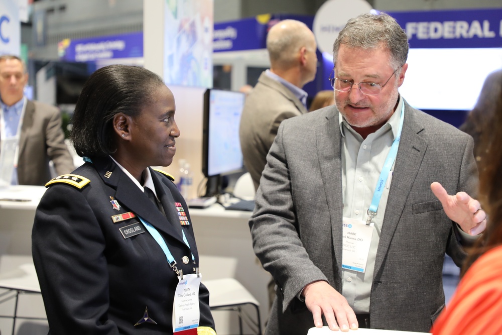 Lt. Gen. Telita Crosland tours the Federal Health Pavilion