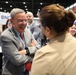 Dr. Lester Martinez-Lopez, Assistant Secretary of Defense for Health Affairs, shares a laugh at the HIMSS Conference