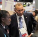 Lt. Gen. Telita Crosland and Pat Flanders tour the Federal Health Pavilion at the HIMSS Conference