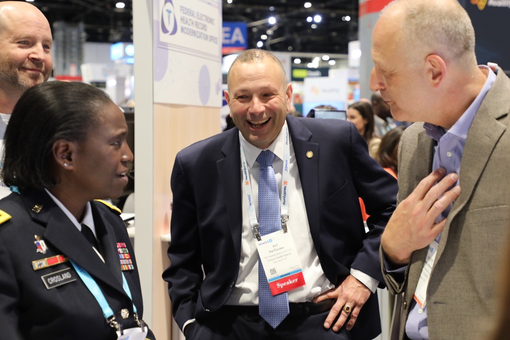 Lt. Gen. Telita Crosland and Pat Flanders tour the Federal Health Pavilion at the HIMSS Conference