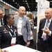 Lt. Gen. Telita Crosland and Pat Flanders tour the Federal Health Pavilion at the HIMSS Conference