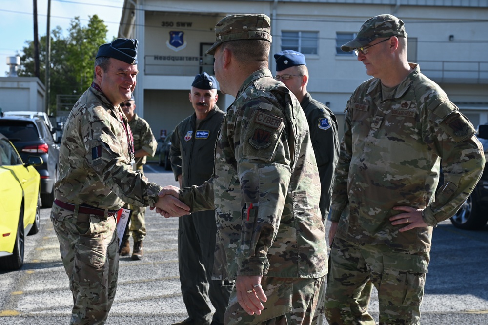 Royal Air Force Commodore Blythe Crawford visits 350th SWW