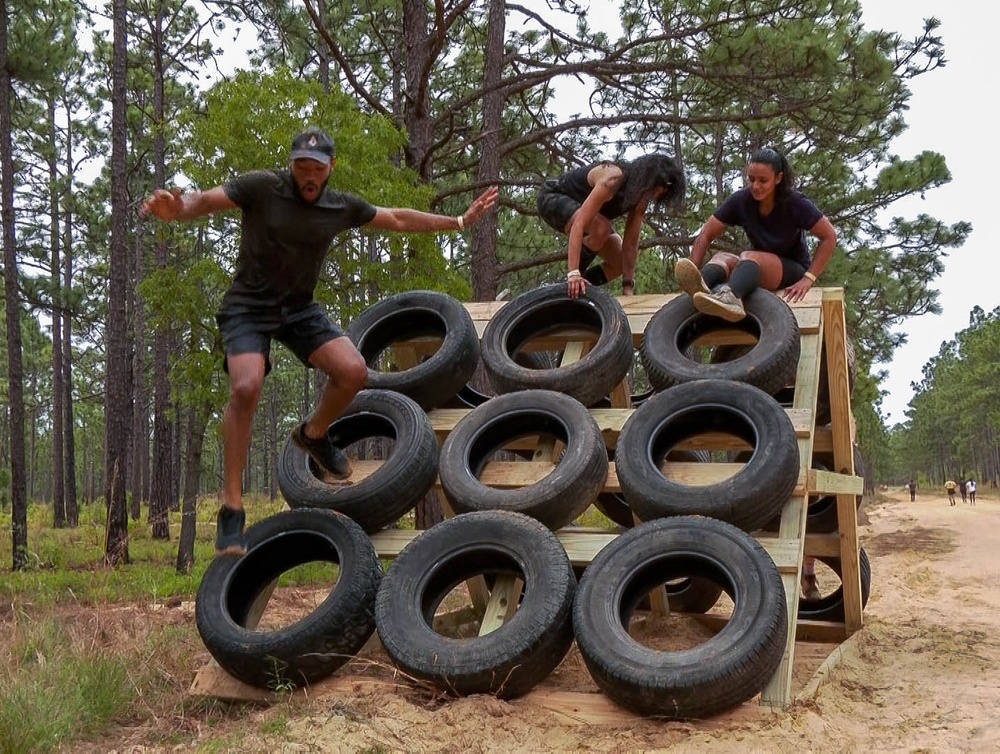 Elated runners take on a 4-mile trail of muck