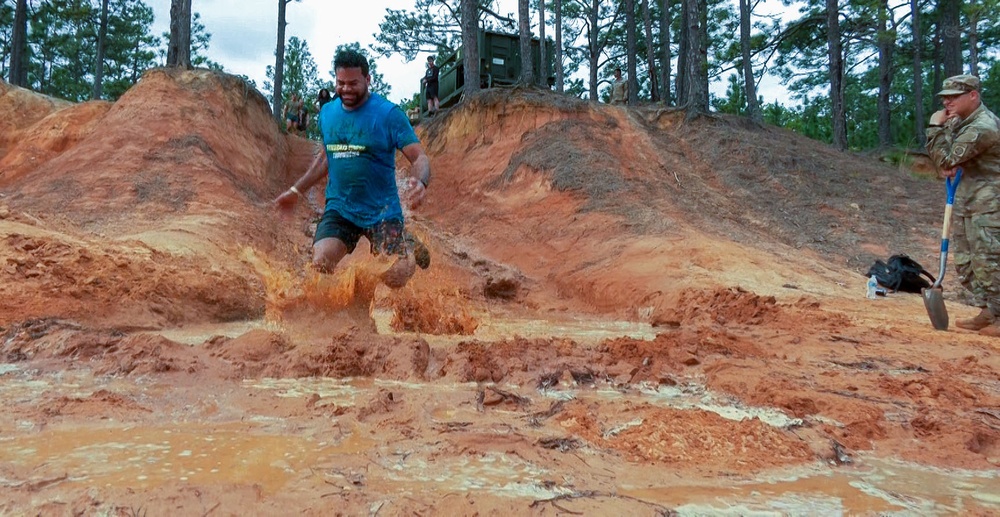 Elated runners take on a 4-mile trail of muck
