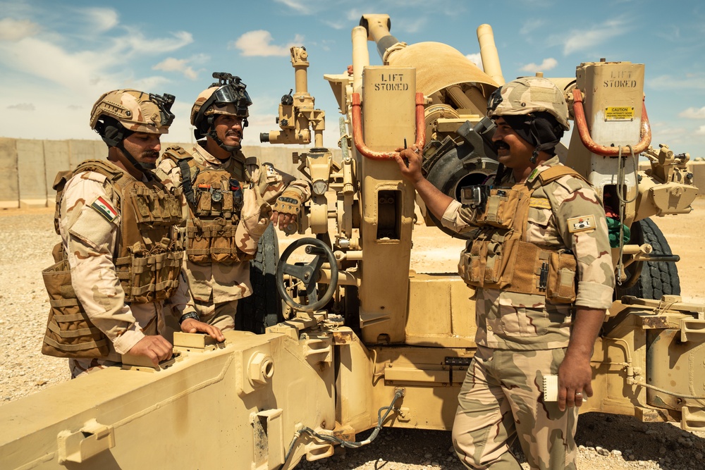 Ohio Army National Guard conduct Howitzer exercises with members of the Iraqi Army