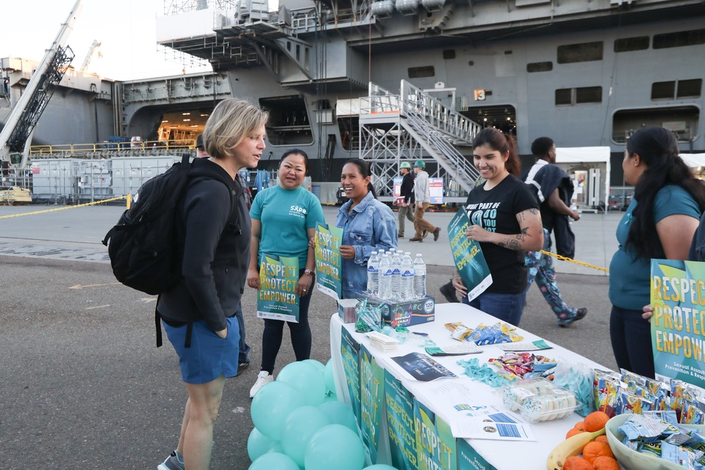 USS Abraham Lincoln SAPR VA team members promote sexual assault awareness