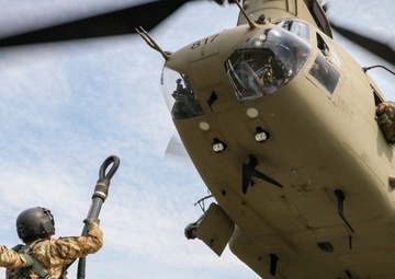 Iowa Chinook crew sling loads F-80 Shooting Star