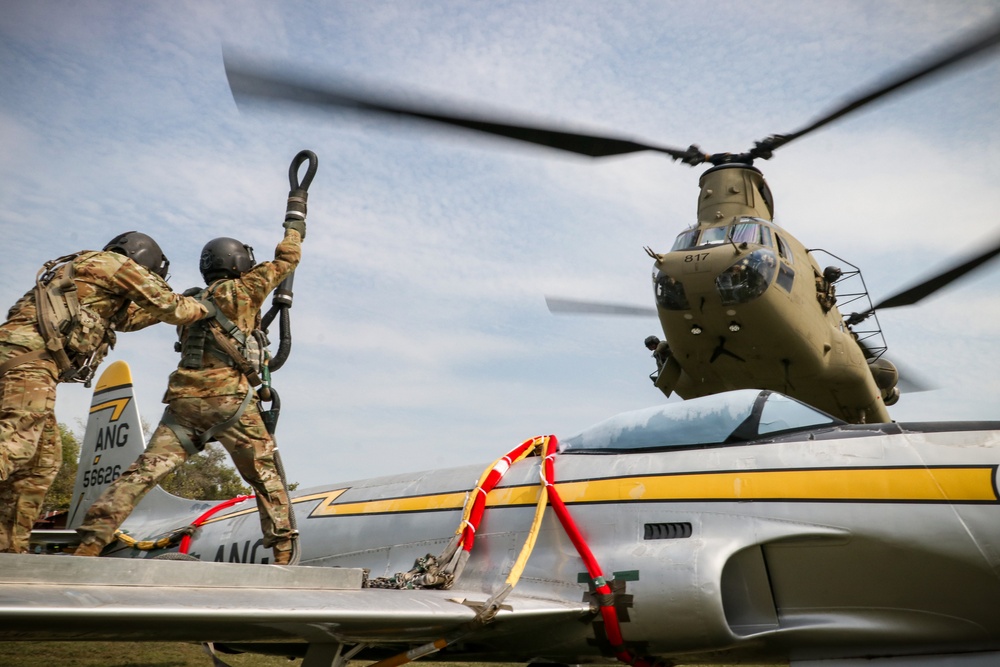 Iowa Chinook crew sling loads F-80 Shooting Star