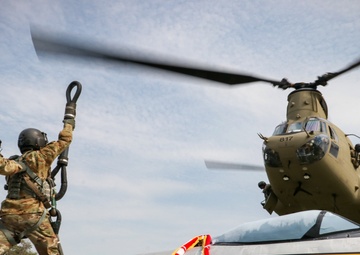 Iowa Chinook crew sling loads F-80 Shooting Star