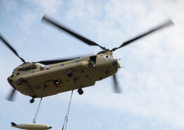 Iowa Chinook crew sling loads F-80 Shooting Star