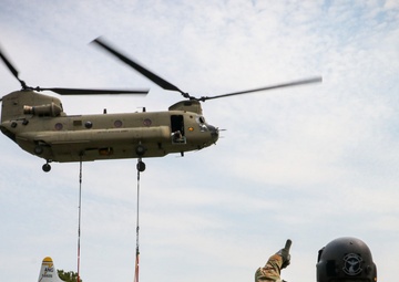 Iowa Chinook crew sling loads F-80 Shooting Star