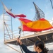 Sailor Raises Signal Flags