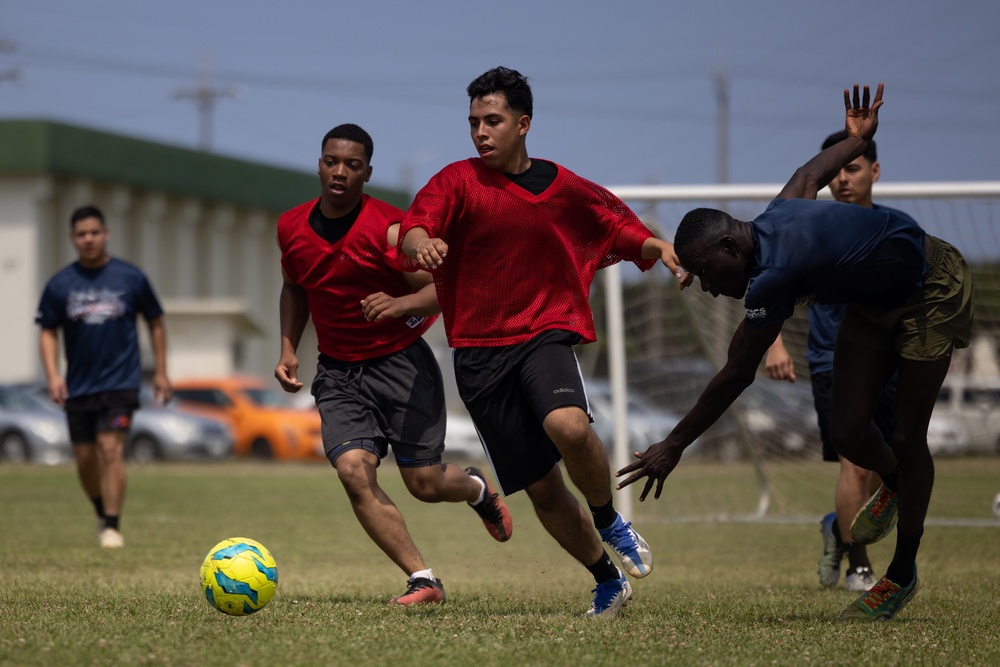 U.S. MARINES COMPETE IN A FIELD MEET