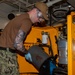 USS Ronald Reagan (CVN 76) Sailors perform maintenance on fire suppression systems