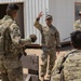 Platoon sergeant gives direction to squad