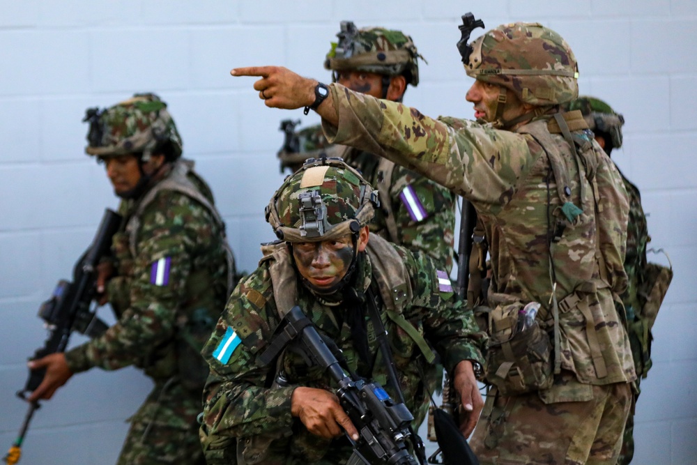 JRTC Rotation 23-07 - U.S. and Colombian Soldiers React To Direct Fire